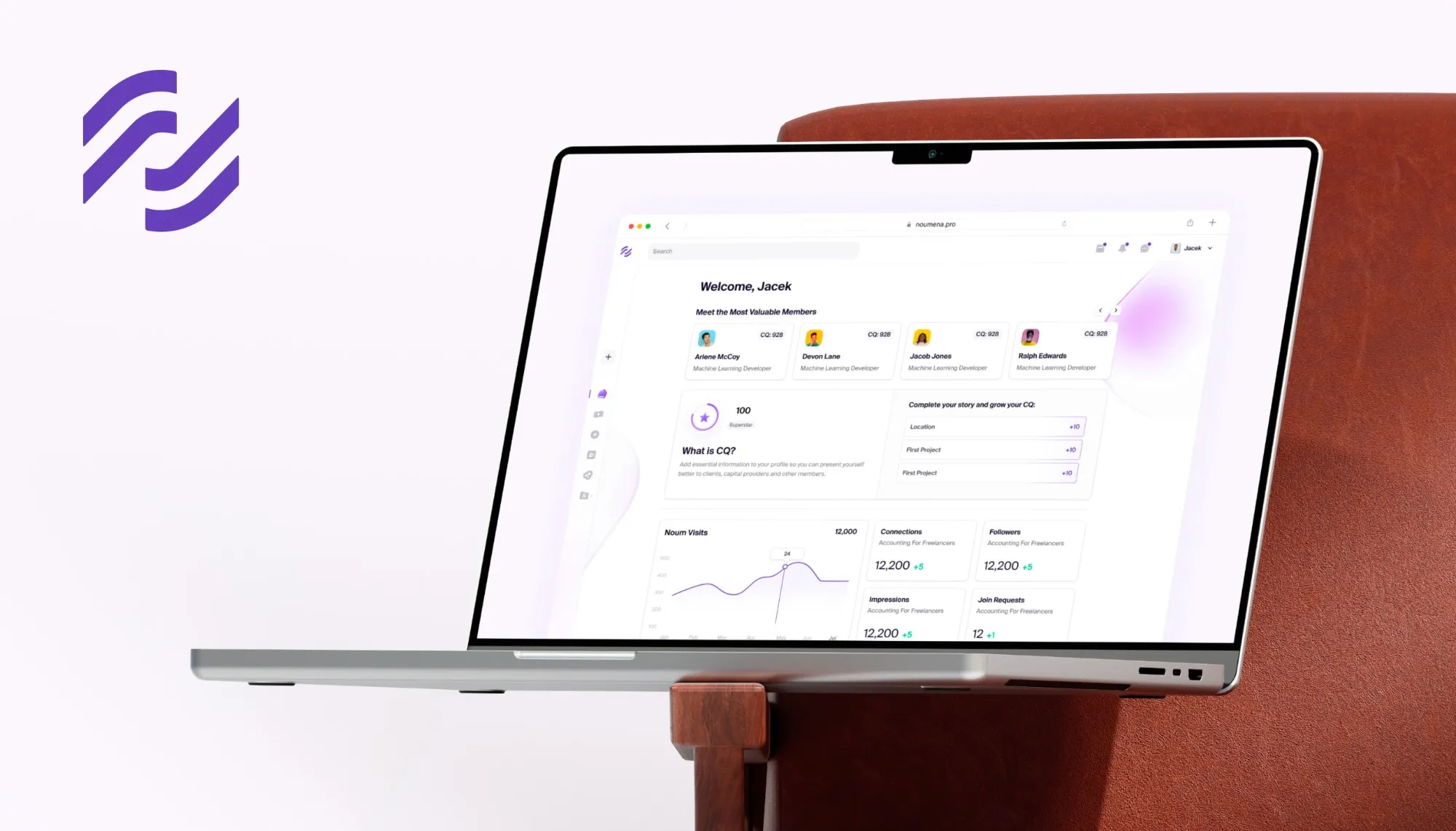 Noumena dashboard on a laptop resting on a leather chair, with the Noumena logo